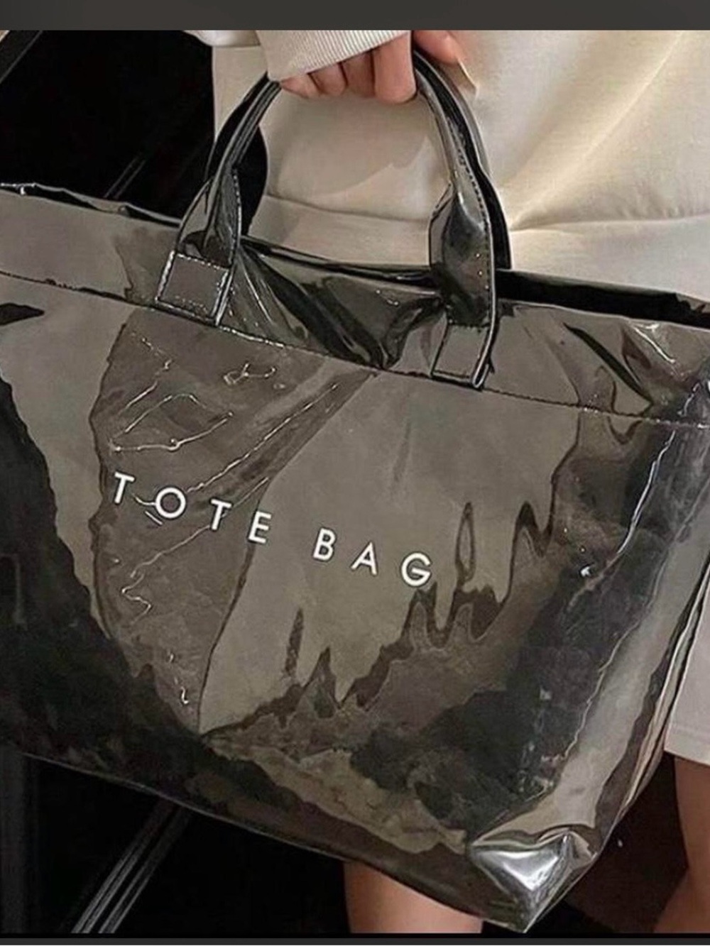 Clear Black Patent Tote Bag with 'TOTE BAG' Text